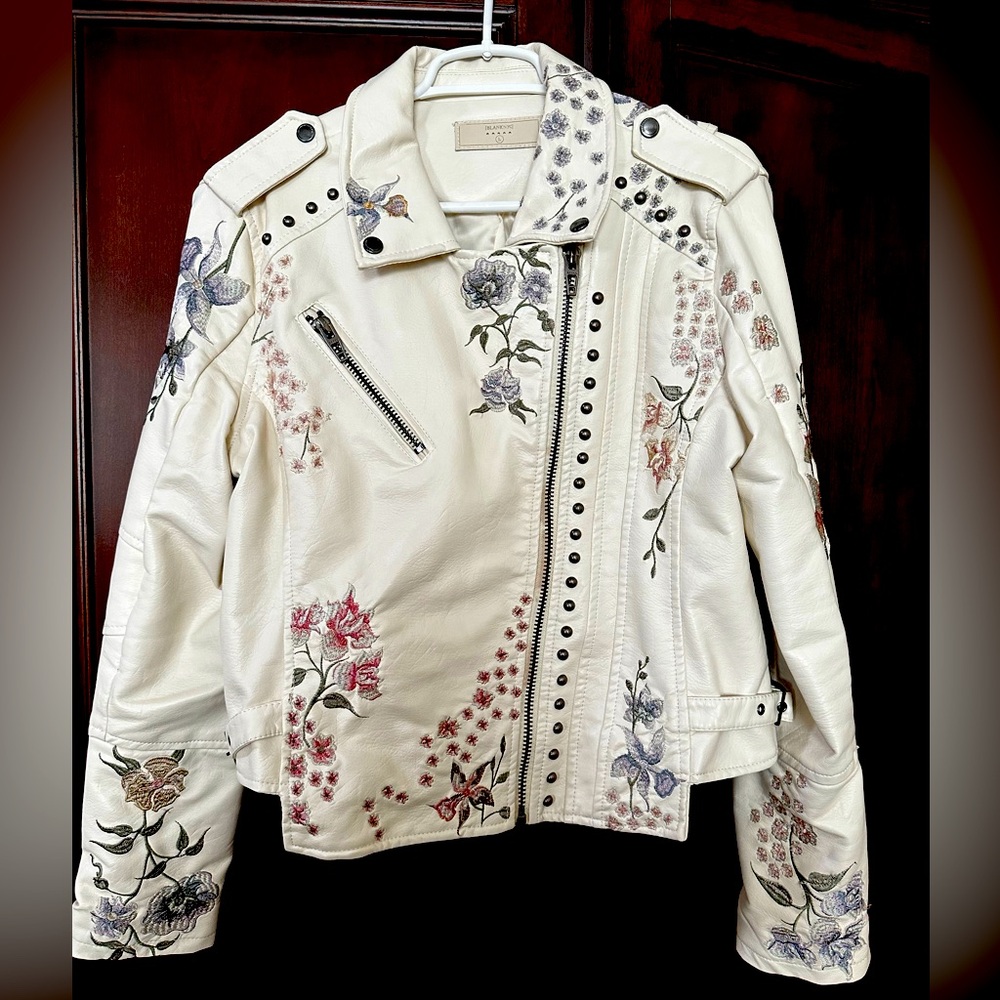Faux leather jacket.  Ivory in color with beautiful embroidery floral.  Size L.